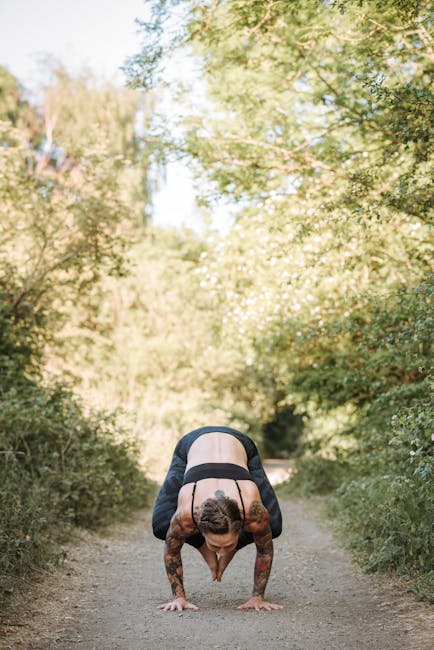 Woman performing a yoga pose in nature